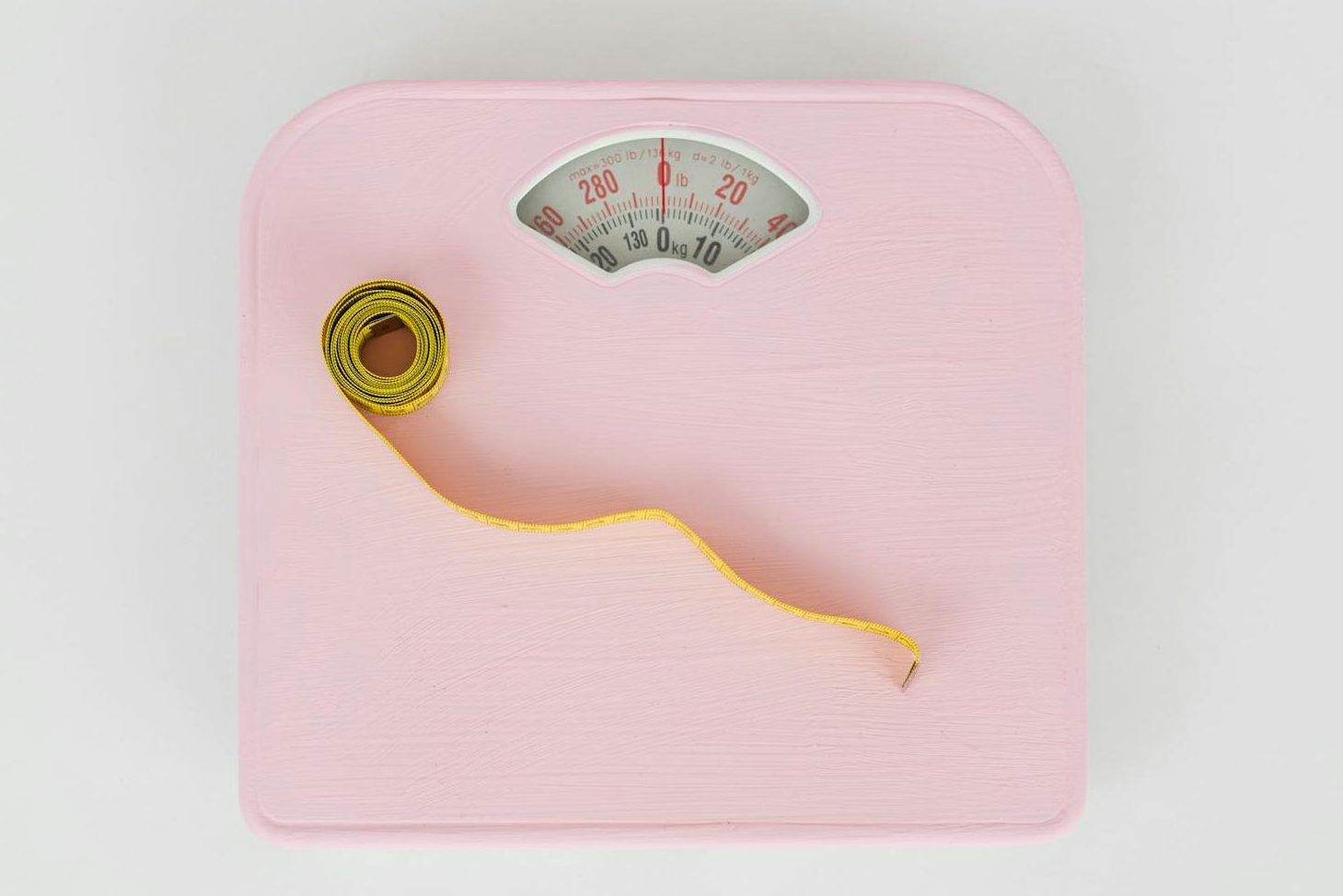 measuring tape on a weighing scale